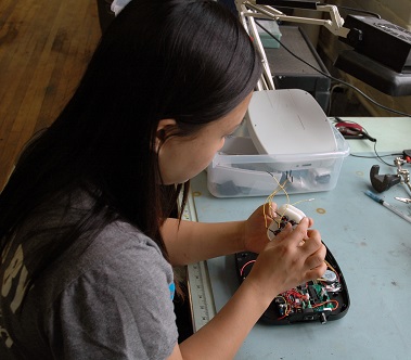 Seong-Hee working on the electronics