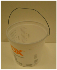 Figure 1is a photo of a ten quart plastic mixing bucket with a wire handle. 