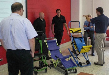 Members of the Emergency Stair Travel Devices Committee with equipment