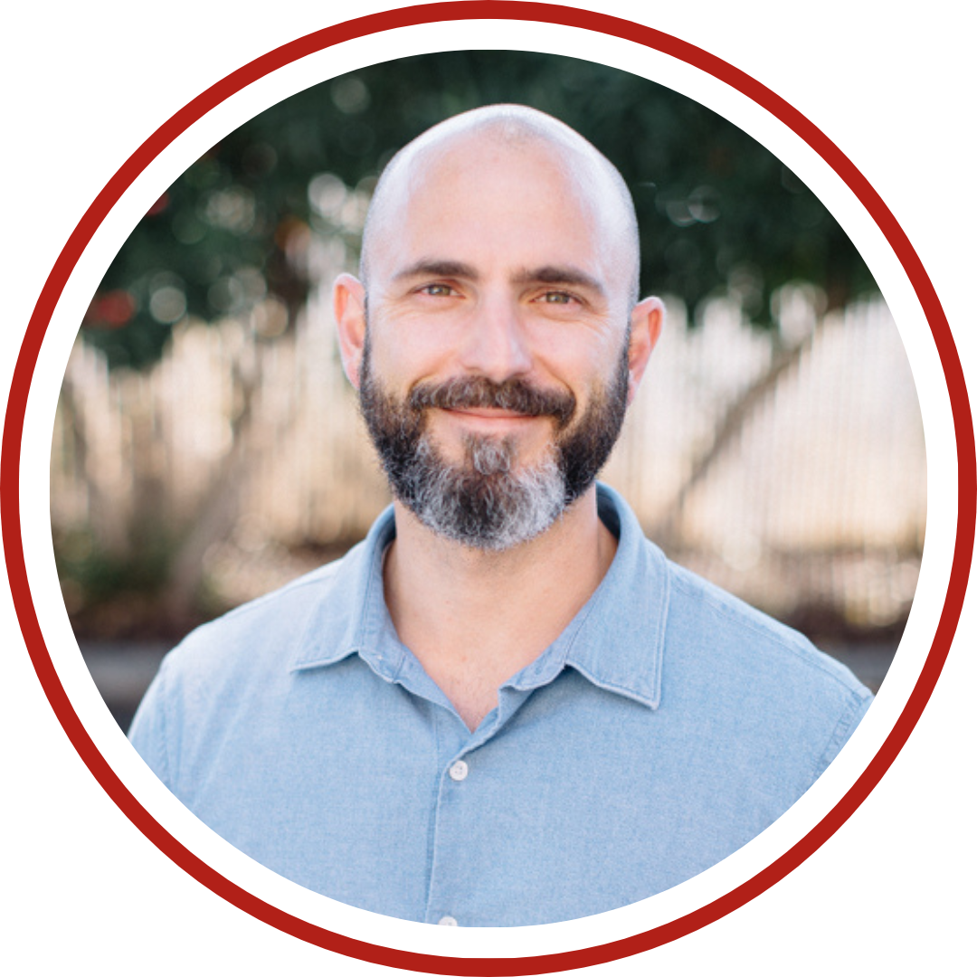 Headshot of Travis Rea.