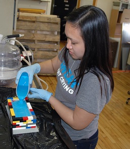 Seong-Hee casting the mold in the TREAT lab