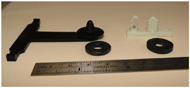 Figure 3 shows the 2 types of washers and the two types if posts that must be assembled together. 