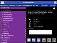 This figure shows the first page of the AccessTools evaluation page. The right half of the page is purple, with a list of building elements with roman numerals listed from top to bottom on the far right. Slightly indented is a second list of numbered sub element. The one labeled “1.Size of Doorway” is in a black box. Slightly indented under this is another list of details, labeled with lower case alphabet. The right side of the page is black. The top of this section has some white text, and an information icon in the top right corner Below this text are 3 buttons. The first is labeled [2] Yes, the second [1] Maybe, and the third [0] No. Below this is a white line, and a fourth button labeled [ ] Not applicable. Below this is a white box labeled “comments”.  On the bottom of the black half of the page are icons depicting a camera, video camera, buildings, a light bulb, a sound icon, and a path.  The top of the page is a blue banner with a menu icon in the top left corner, the text “AccessTools” in the center, and the ARB logo (stylized white cityscape) in the left corner. 