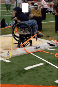 This figure shows the experienced athlete  taking a stance to throw the javelin at the Buckeye wheelchair games. He is using the manual wheelchair seat elevator and his wheelchair used for practice.