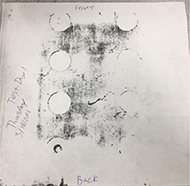 Carbon Sheet after Dropping Test showing the weight distributed over the center portion of the plate towards the front