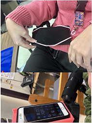 The image on the left displayed the example for one resident of an off-the-shelf assistive device, which is a rubberized phone holder secured at four corners of the phone, then secured to the resident for transport of the phone with a lanyard around the neck. The image on the right is an example of a 3D printed wheelchair phone holder, attached to the right-sided armrest for the resident, and angles the phone slightly upright to face the user sitting in the wheelchair.  It is customized to be the same size as the phone, and is pink in color.