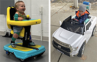 Picture 1: A young boy sits in a yellow and blue Explorer Mini with a big smile on his face as he looks forward. Picture 2: A different young boy in a hat and coat sits in a white Toyota Tundra adapted ride-on car with a switch mounted on the steering wheel and PVC supports added.