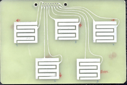 This figure shows one of the initial versions of the mouse which had only five pads for basic operations like movement of cursor in all the four directions and 'enter'. 