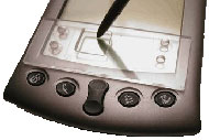 Image shows a photograph of a Palm V device (formerly called a “Palm Pilot”) with a clear piece of plastic covering the text input area. A square hole has been cut in the plastic which is 1.69 cm on each side, and the stylus (pointer) of the Palm goes through the hole to the Palm touch-sensitive surface. Characters in EdgeWrite are entered by stroking inside the square from corner to corner, along the edges or across the diagonal.