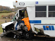 Vehicle damage to the 1998 Ford F-150 van in case WC-006, which starts at the left-front corner and extends down the left side through the driver door.