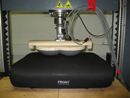 Figure 1 shows a line drawing of the buttocks model of  used to load adjustable and non-adjustable wheelchair cushions.  Two models are used that are based on this drawing. Model A has a pelvic width of 32 cm, while Model B has a pelvic width of 29.5 cm.   