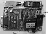 This is a photograph of the Board of Education with the wiring from Figure 1 attached. 