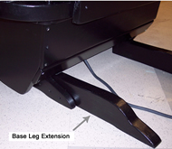 Image displays a rear view of the chair base.  The picture shows two eight-inch long, two inch wide, and four inch high base extensions attached by screws to the original chair base legs.