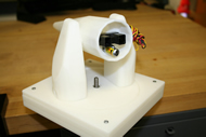 This photograph shows the assembled laser joystick prototype grown from the Dimension 3D printer.  The bolt in the center mounts the joystick to the Tash arm.   