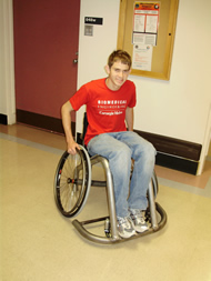 This picture shows the primary author sitting in the wheelchair. 