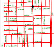 Figure 2 shows part of the SVG map of downtown Chicago generated by the algorithm from the SVG input file part of which is shown in Figure 1. The streets form a grid of lines. The street lines are in red, the street names are in green. The street line widths and colors, the font style, size, and color can be changed by the user. 